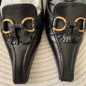 Prada 3" inch heel with tassel detail.